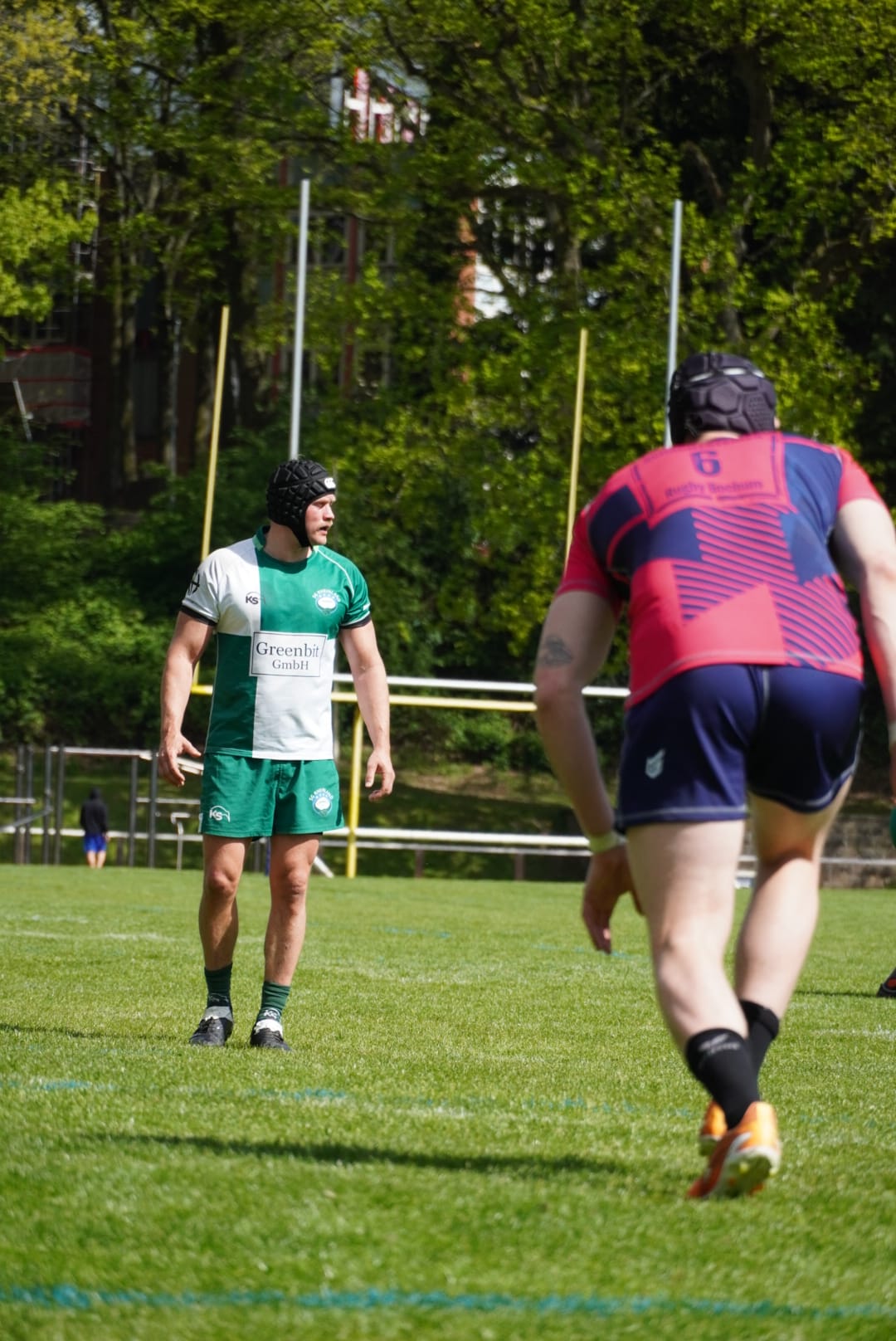 Spieler auf dem Platz vor dem Goalpost
